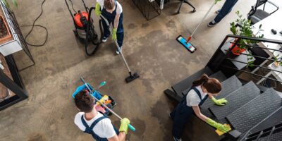 top view of cleaning company team cleaning modern office